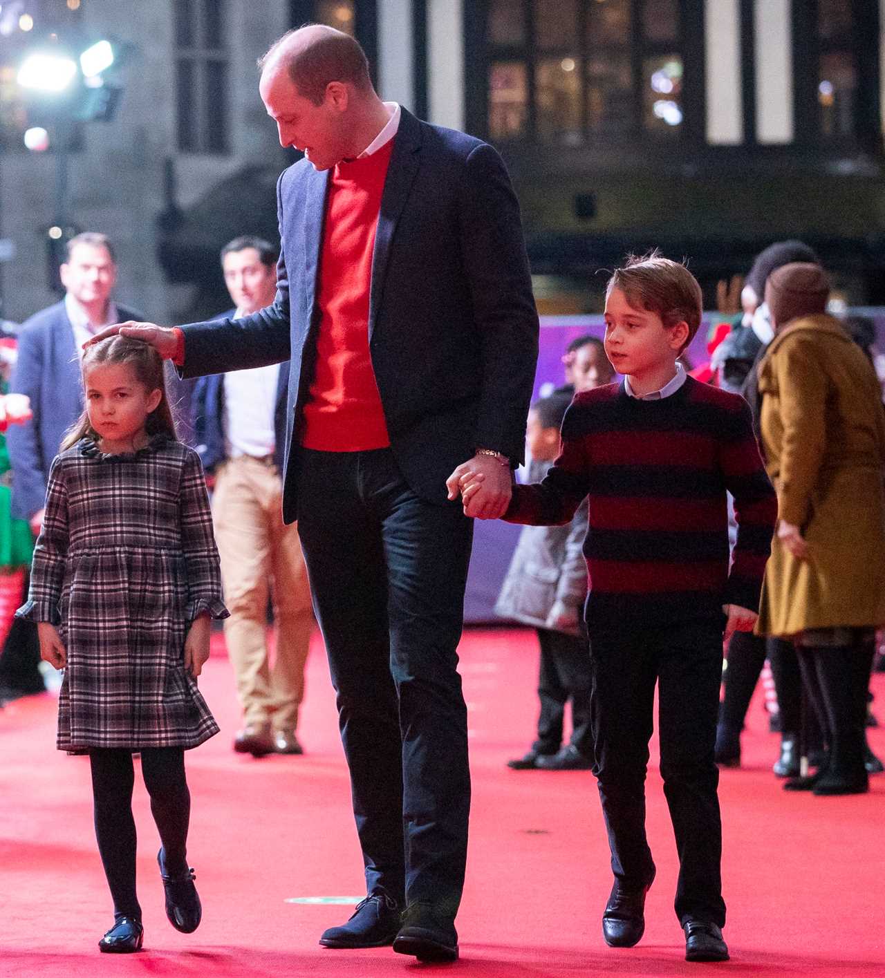 The family-of-five walked arm in arm together on the red carpet at the London Palladium to thank key workers