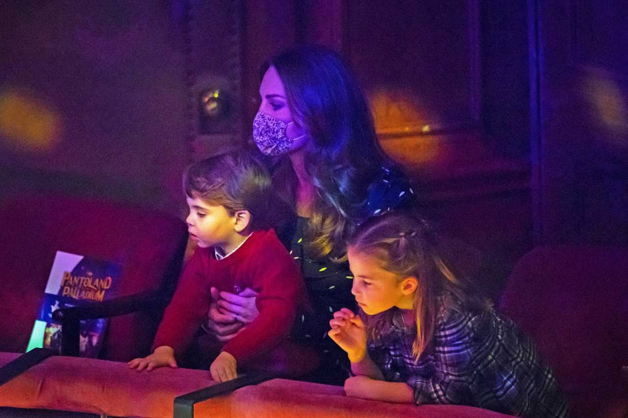 For much of William’s speech at the performance, Louis sat on Kate's lap