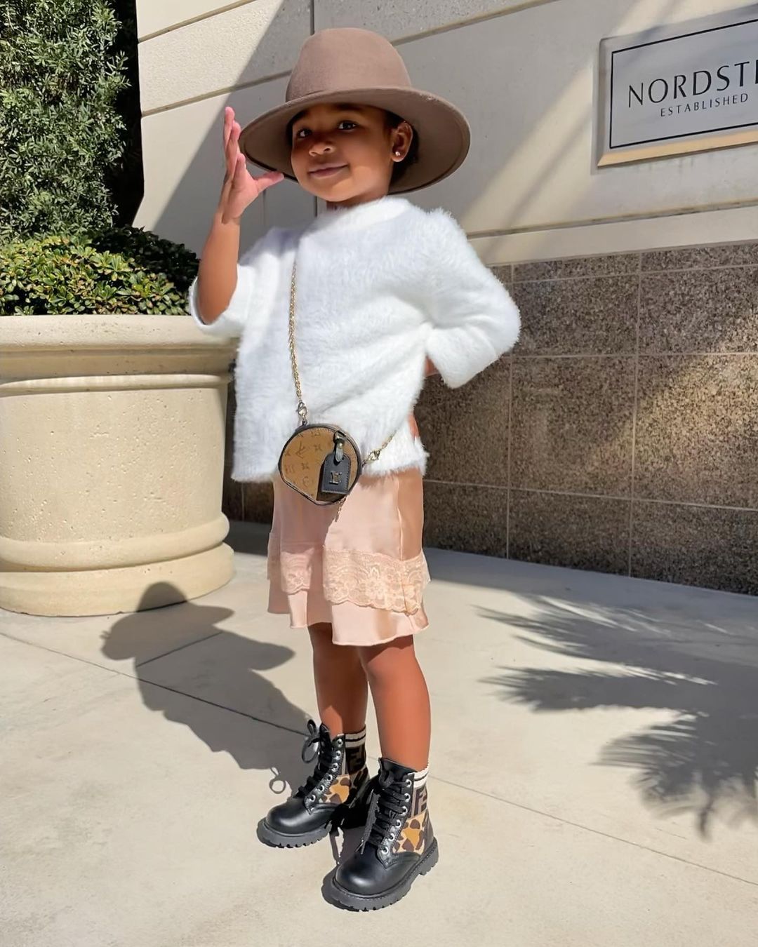 She shared a snap of True wearing Fendi boots