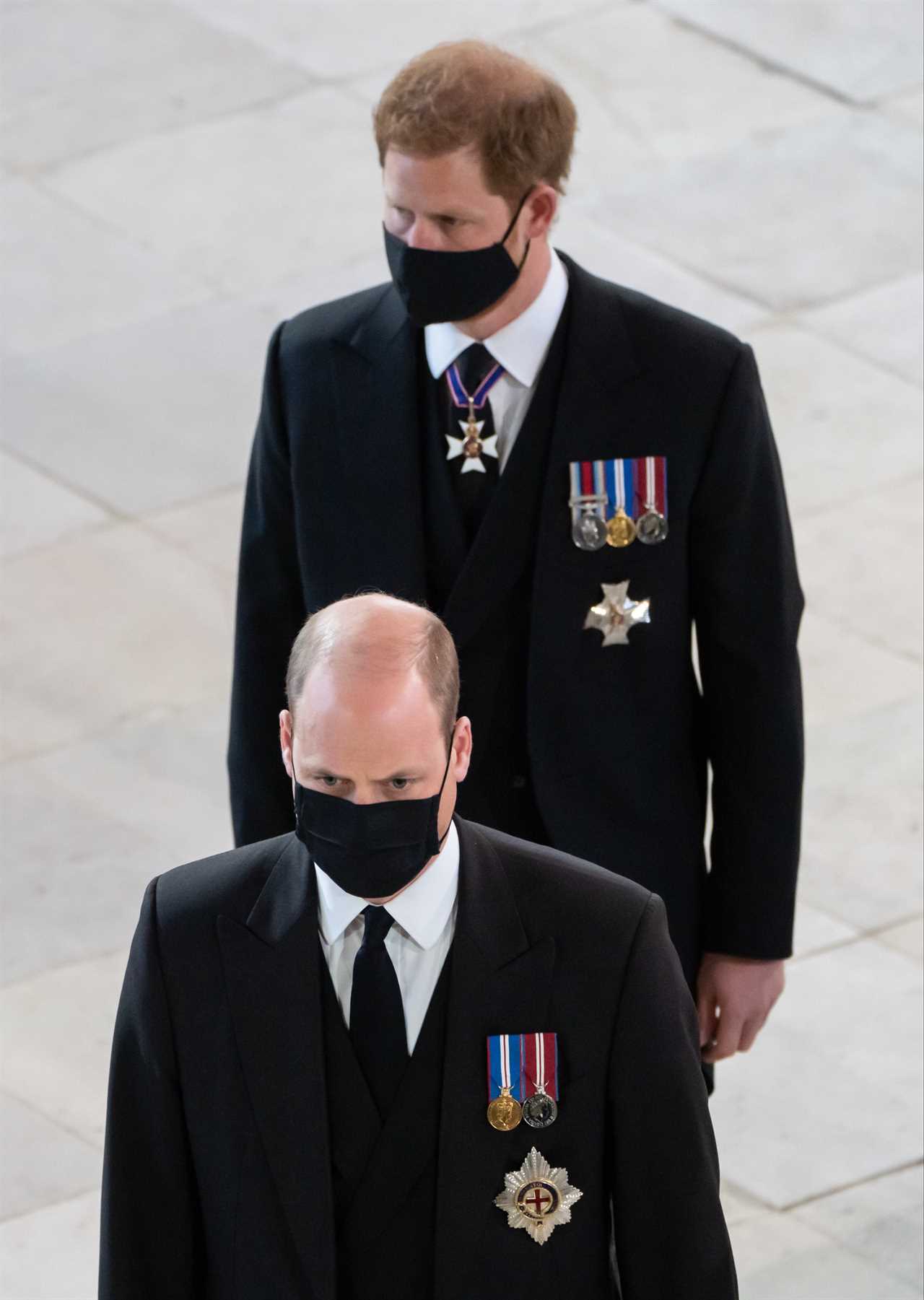 Harry then stood behind William as they stood sombrely in the chapel as the coffin was gently put down