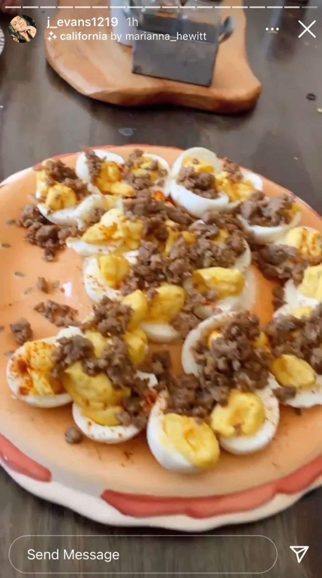 Her deviled eggs sprinkled with sausage was certainly a head-turner