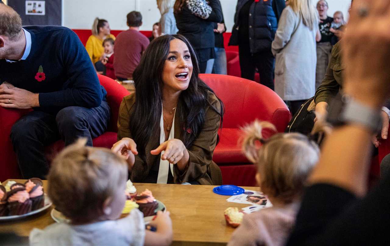 The Duchess wore the two astrological necklaces during a visit to Broom Farm Community Centre in Windsor earlier this month