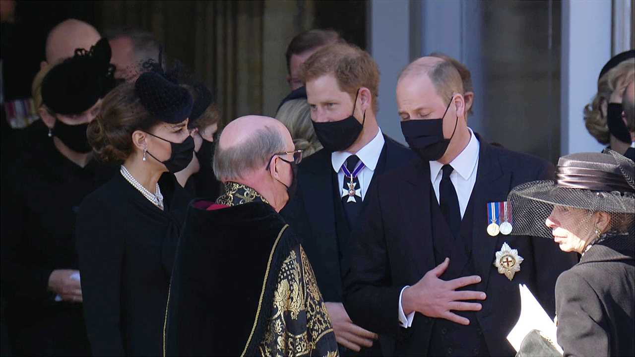 Kate, William and Harry talking to the Dean of Windsor after the emotional service