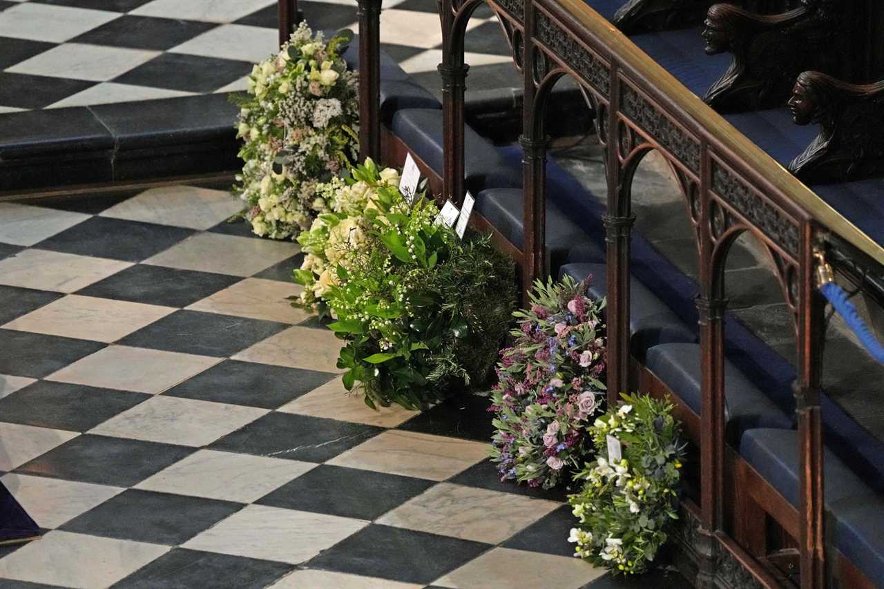 Harry and Meghan hand-selected flowers on the colourful wreath they offered as a tribute (second from right)