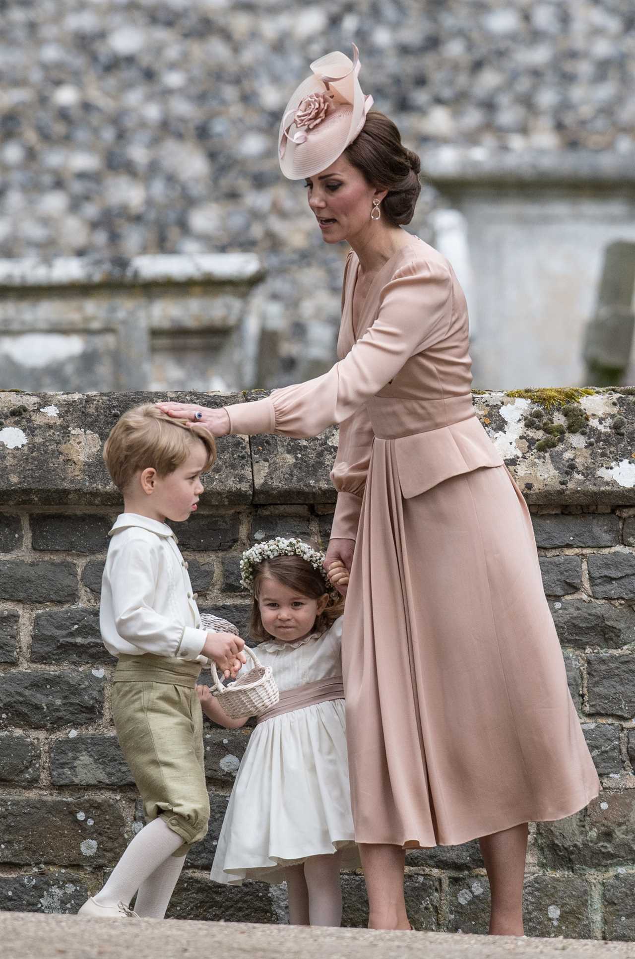 At the wedding of Pippa Middleton in 2017, Kate was seen giving George a friendly pat to stop him acting out 