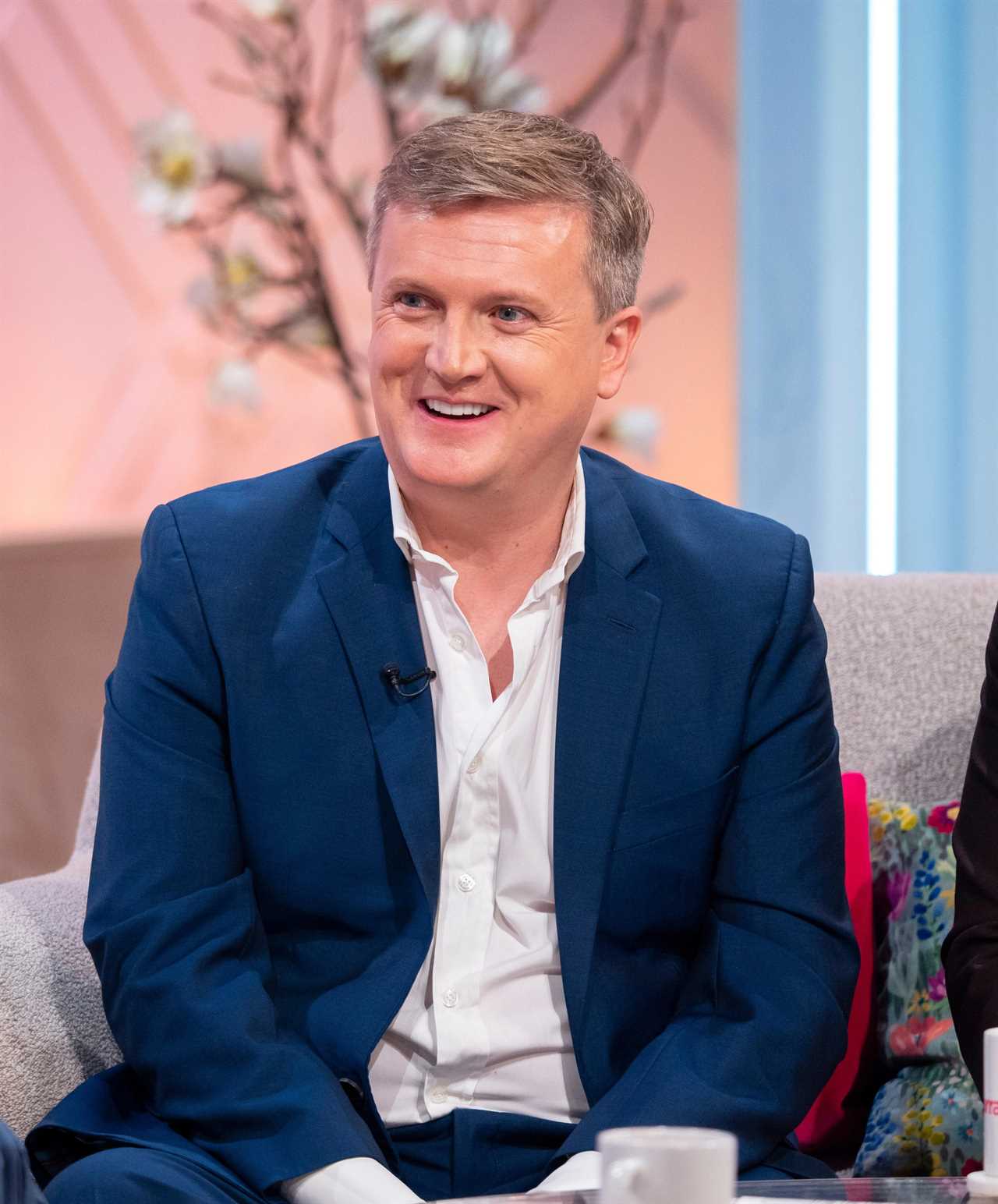 Russell believes his pal Aled Jones is the mystery singer