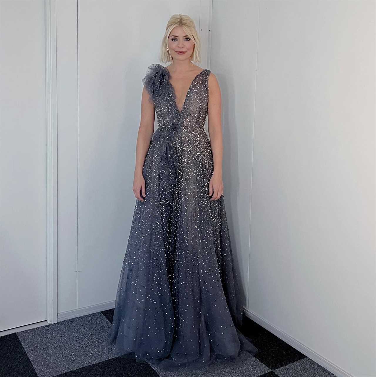 Holly Willoughby unveiled her look for Dancing On Ice and posed in a sparkly designer gown