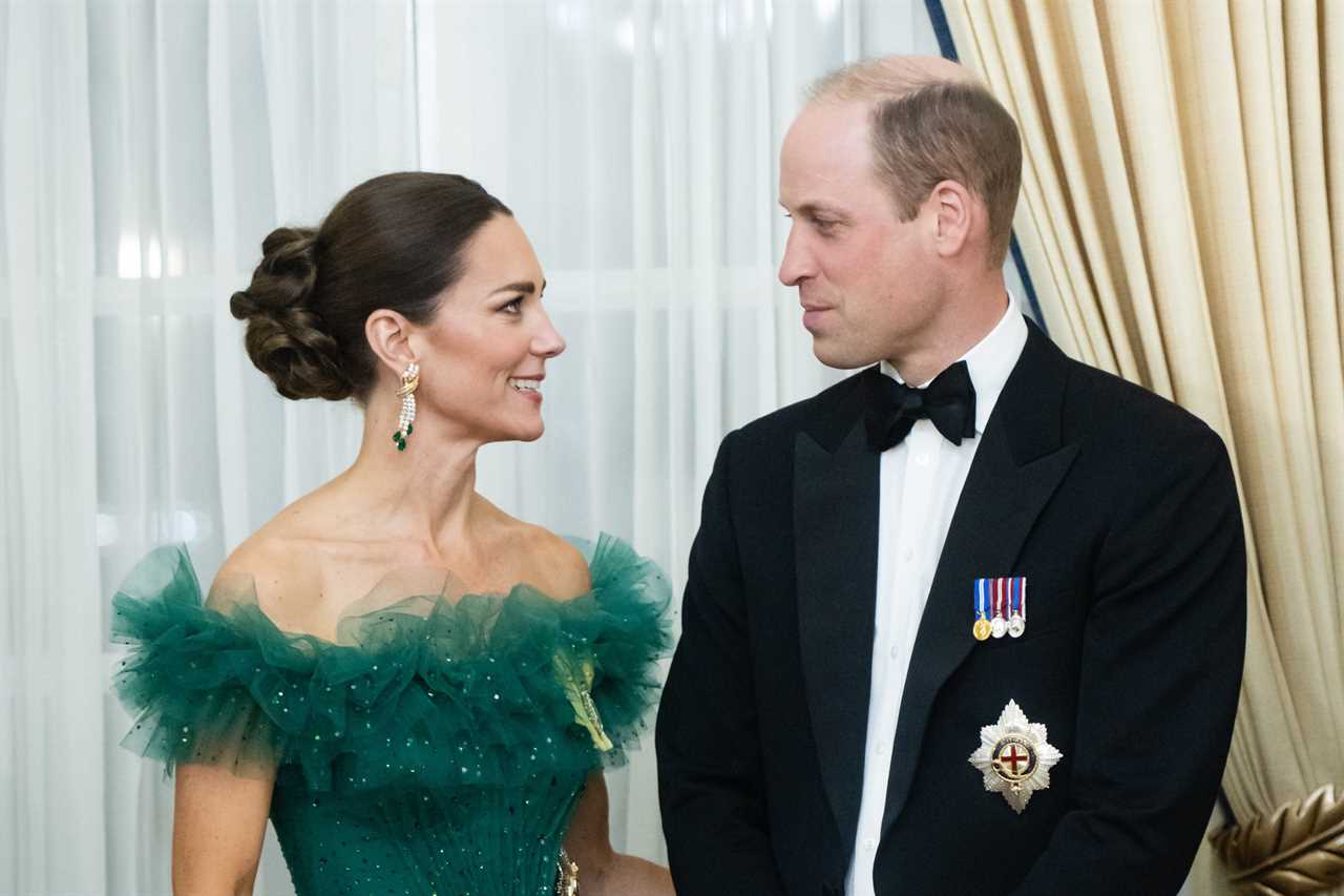 Kate Middleton is all smiles as rain lashes down during school visit with Prince William in Bahamas