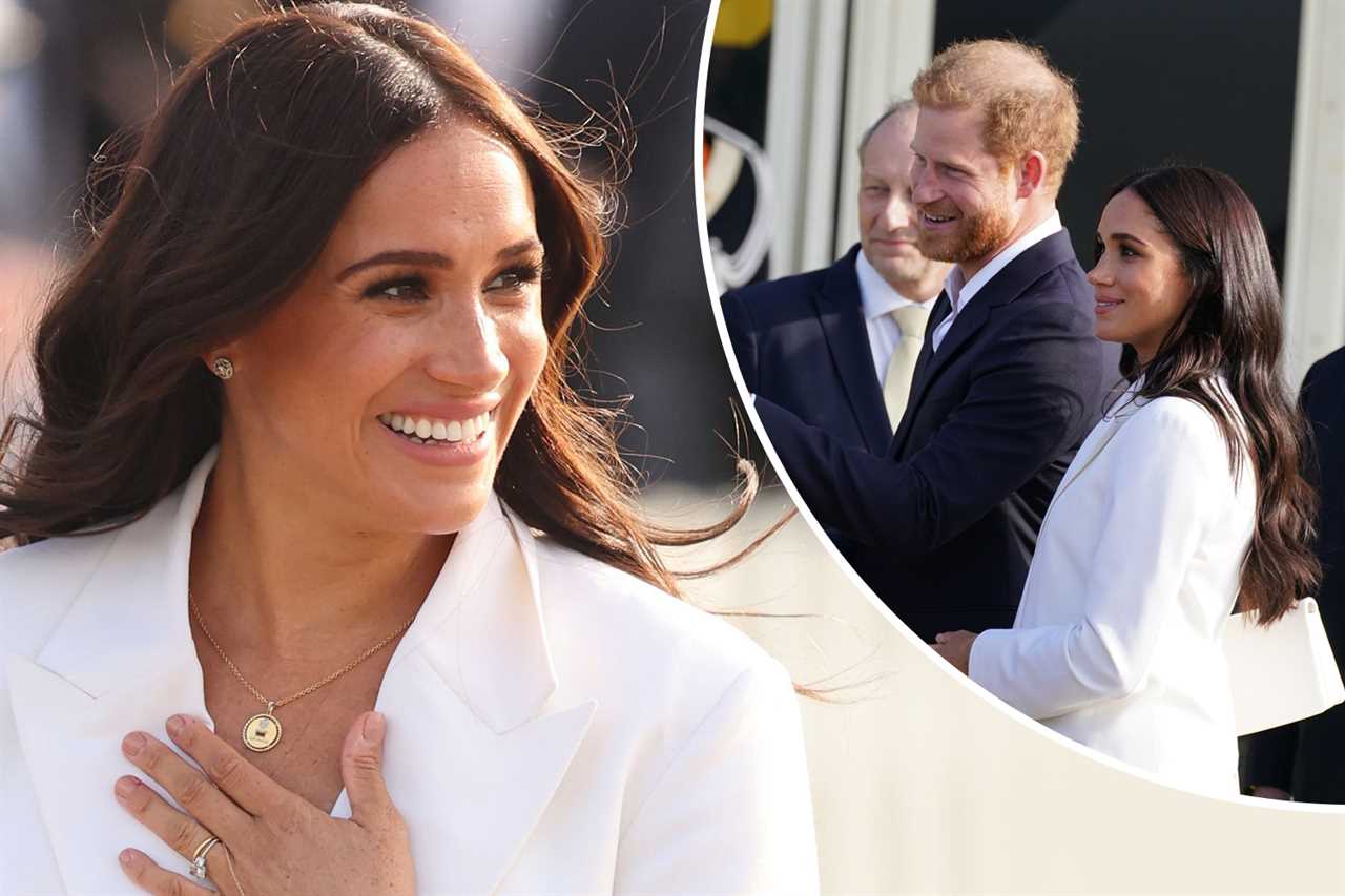 Meghan pulls out all the stops in a crisp £6,210 power suit as she joins Harry for Invictus Games welcome reception