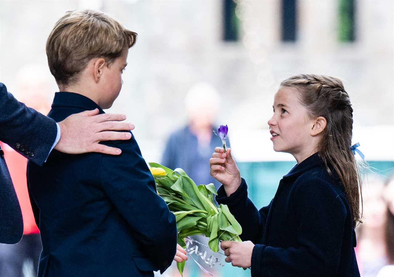 Royal fans all say the same thing as they spot Princess Charlotte making secret gesture to Prince George on the balcony