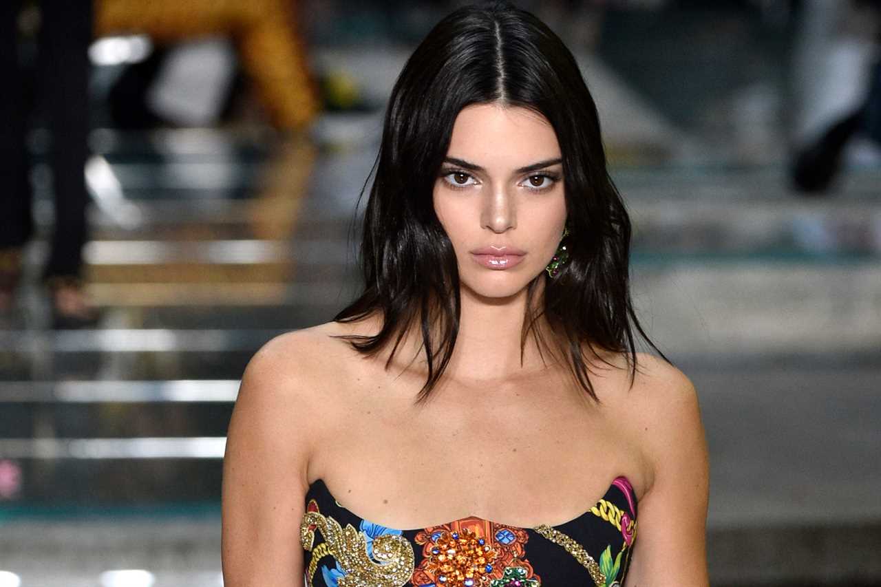 Kendall Jenner shows off her big pout and looks unrecognizable after fans accuse the star of getting ‘lip fillers’