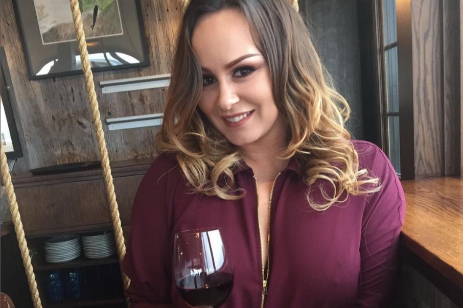 Chanelle Hayes flashes her sparkling engagement ring as she kisses fiancé Dan Bingham on dog walk