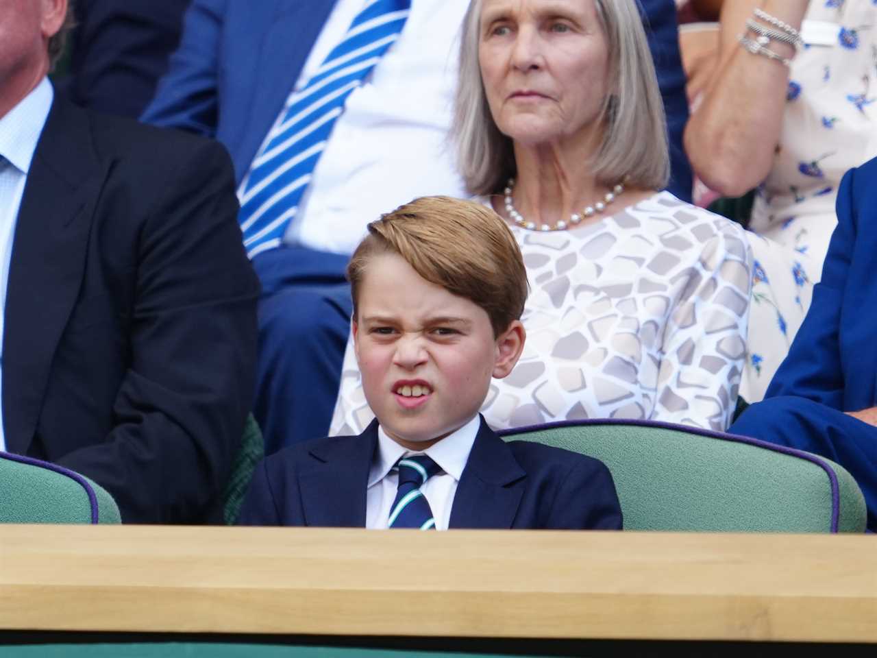 Eagle-eyed royal fans are all saying the same thing about Prince George’s quiet chat with dad William at Wimbledon