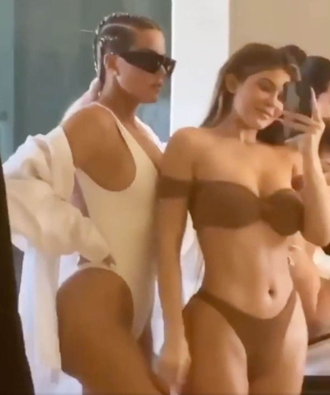 Kardashian fans cringe over Kylie Jenner’s ‘inappropriate’ behavior toward Khloe during bikini shoot in resurfaced clip