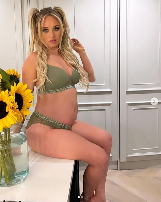 Jorgie Porter shows off baby bump in bright crop top as she celebrates engagement