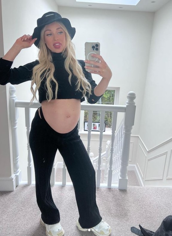 Jorgie Porter shows off baby bump in bright crop top as she celebrates engagement