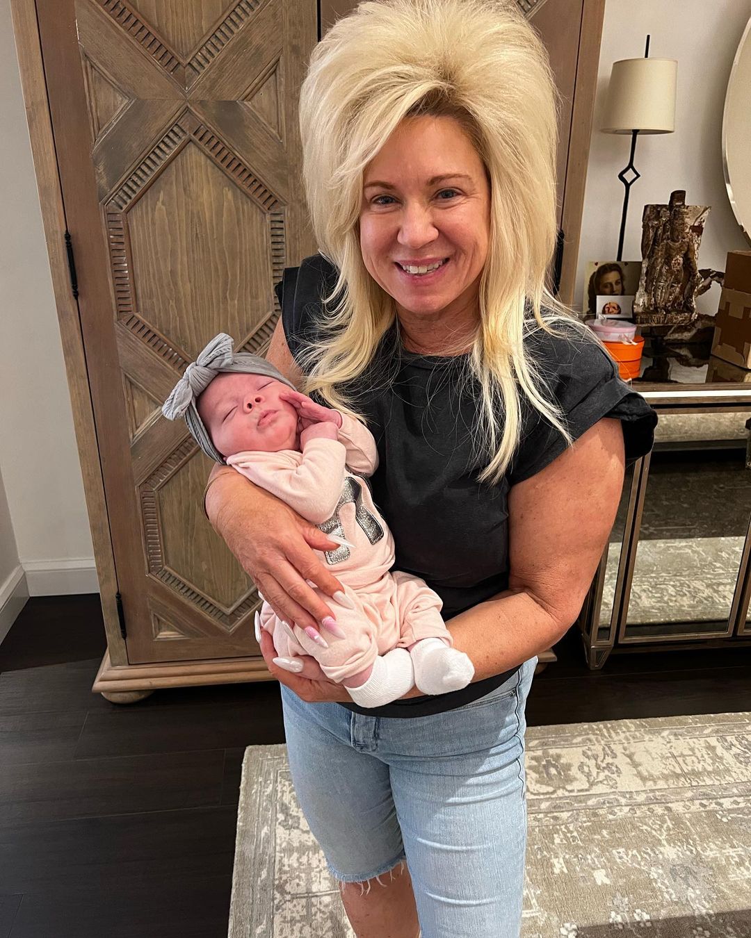 Long Island Medium fans think Theresa Caputo’s son Larry is engaged to girlfriend Leah as they spot ‘clue’ in rare photo