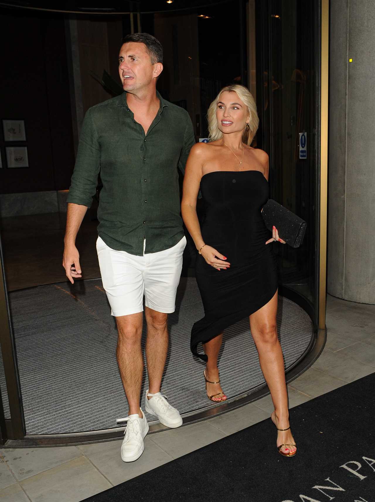 Pregnant Towie star Billie Faiers displays her growing baby bump as she heads to dinner with husband Greg Shepherd