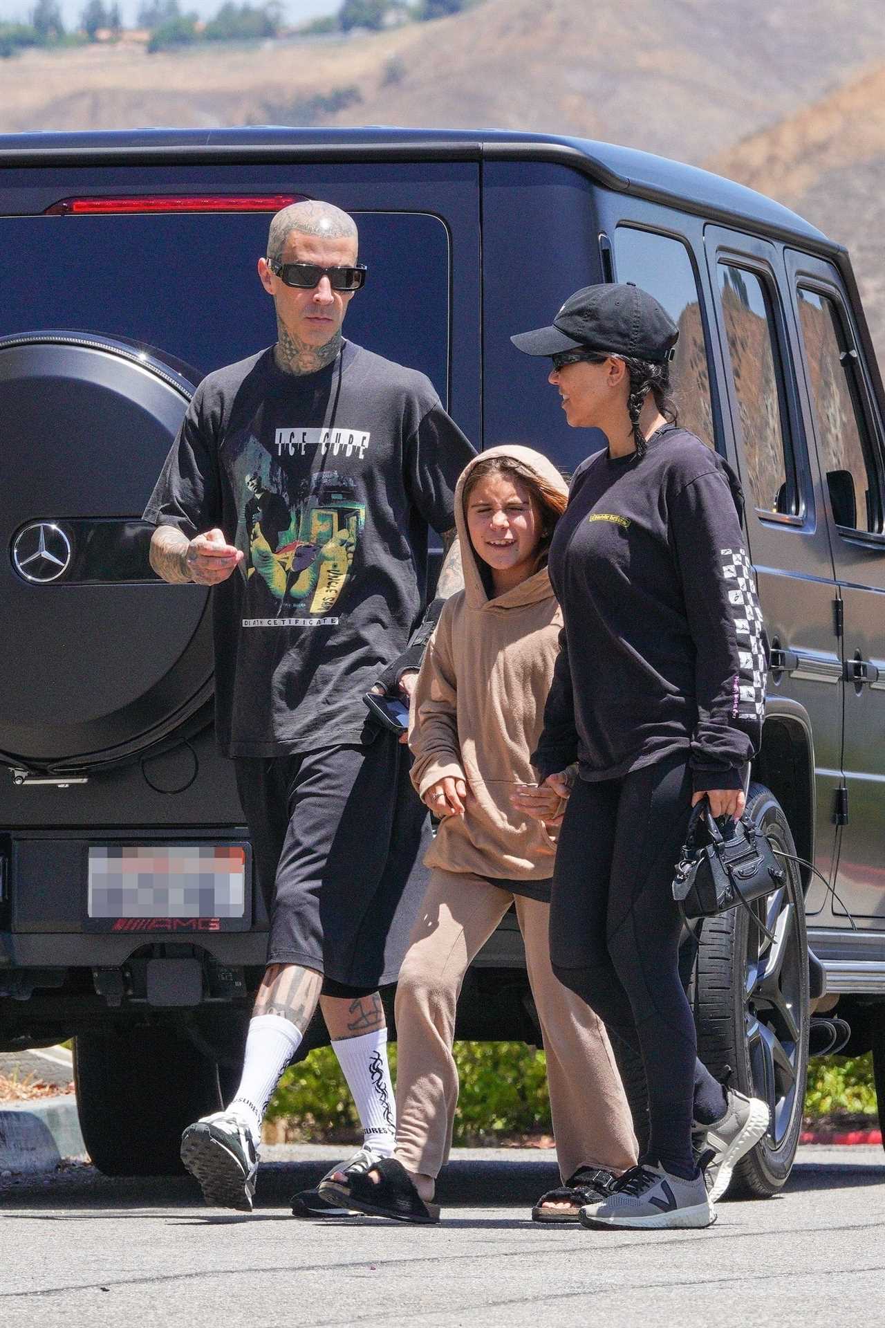 Kourtney Kardashian’s daughter Penelope, 10, ‘copies’ Travis Barker’s rocker style during family outing together in LA