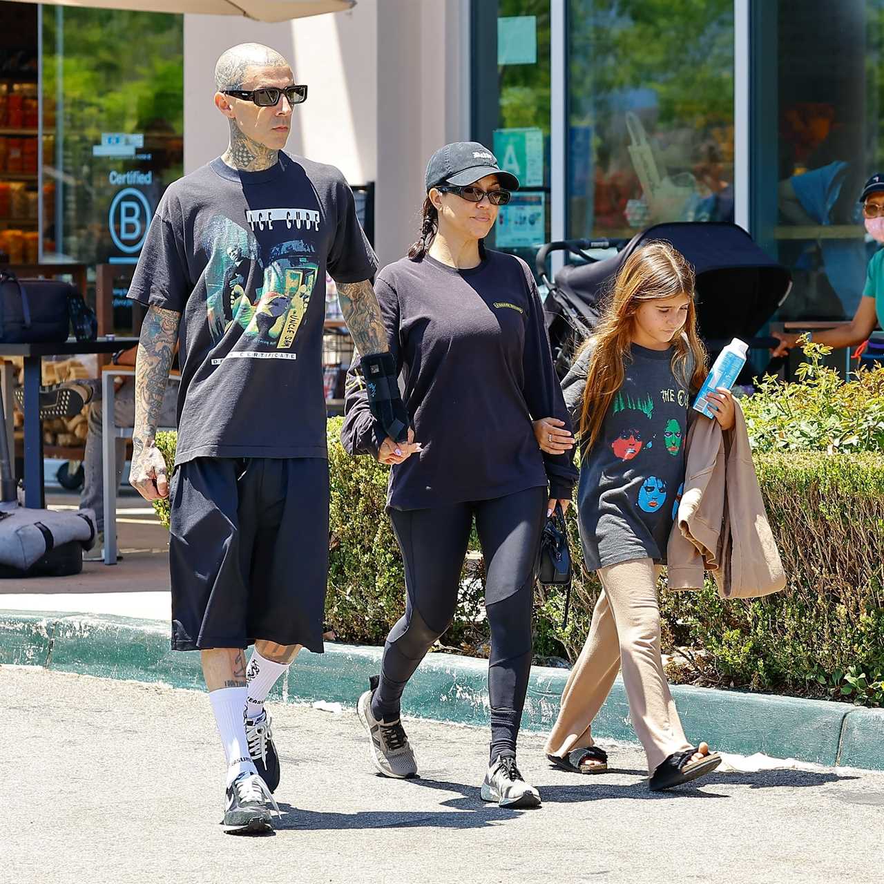 Kourtney Kardashian’s daughter Penelope, 10, ‘copies’ Travis Barker’s rocker style during family outing together in LA