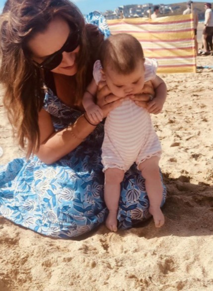 Catherine Tyldesley shares beautiful snaps as her baby daughter Iris enjoys her first holiday