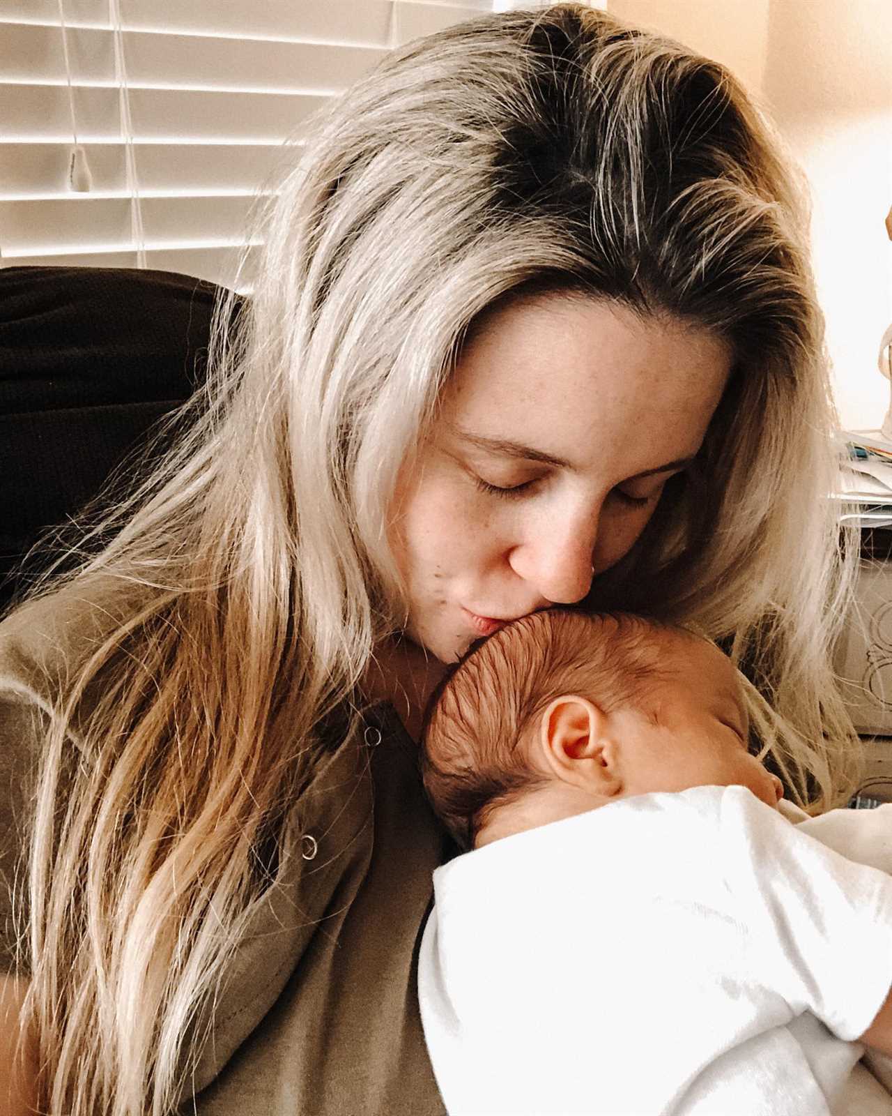 Jill Duggar ‘snuggles’ with newborn son Freddy in sweet new pic after showing off her baby boy’s lavish nursery