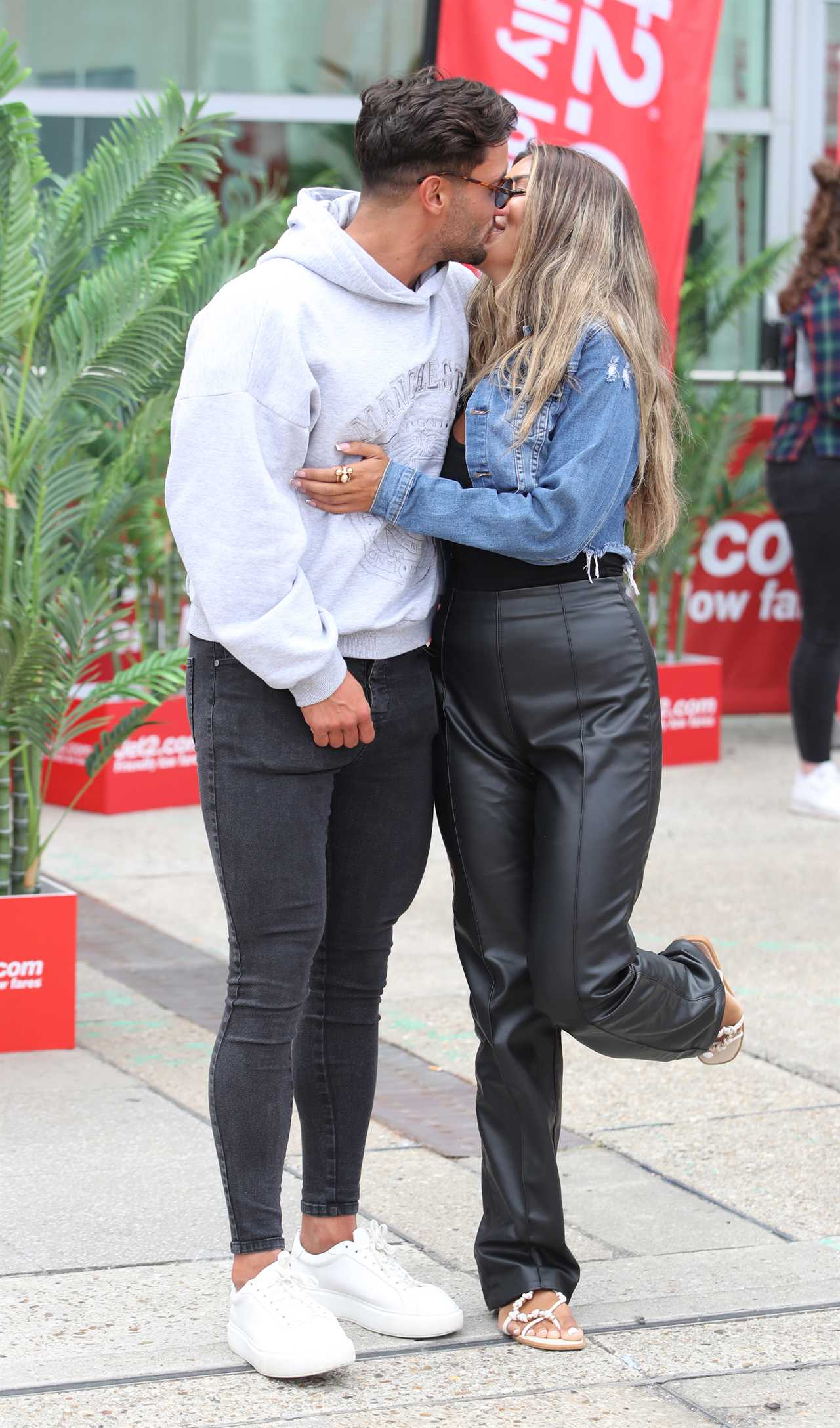 Love Island finalists look ecstatic as they get mobbed at the airport as they finally arrive home