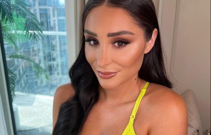 Love Island’s Tasha Ghouri shows off her abs in a barely-there dress after incredible birthday celebrations