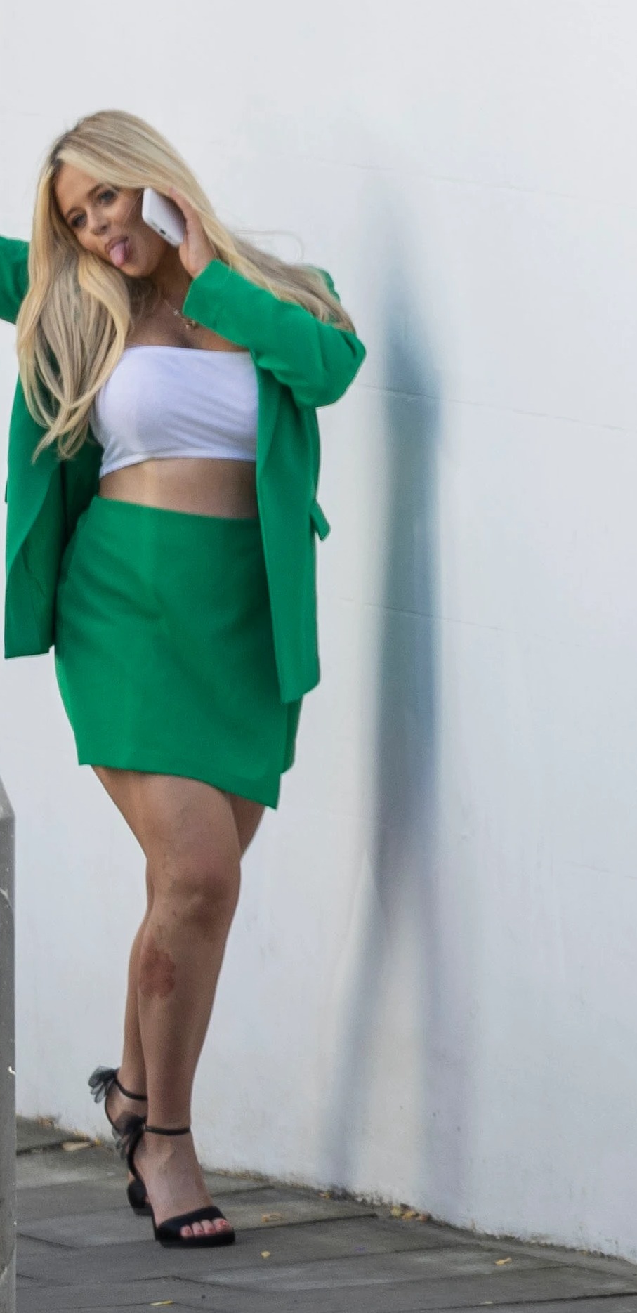 Emily Atack stuns in emerald suit and black heels during London photoshoot