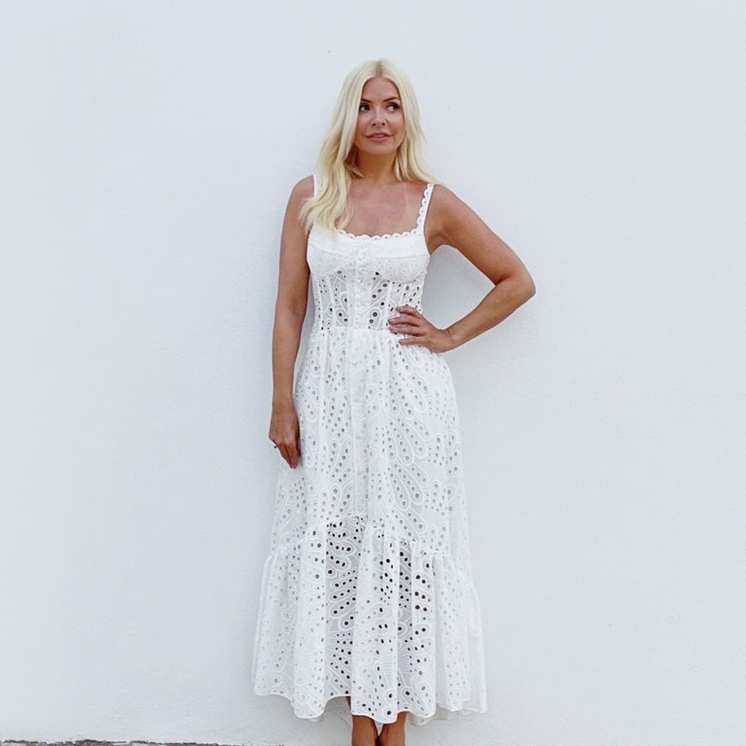 Holly Willoughby looks stunning as she shows off her new hair in a white dress on holiday