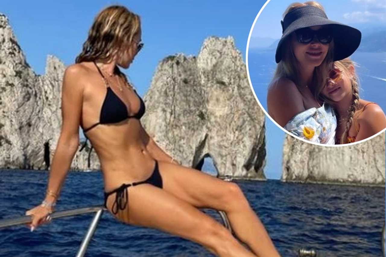 Amanda Holden sizzles in plunging pink swimsuit on luxury family holiday