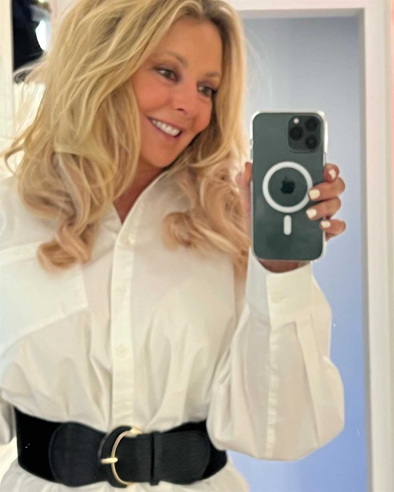 Carol Vorderman flashes her toned figure as she debuts stunning new hair