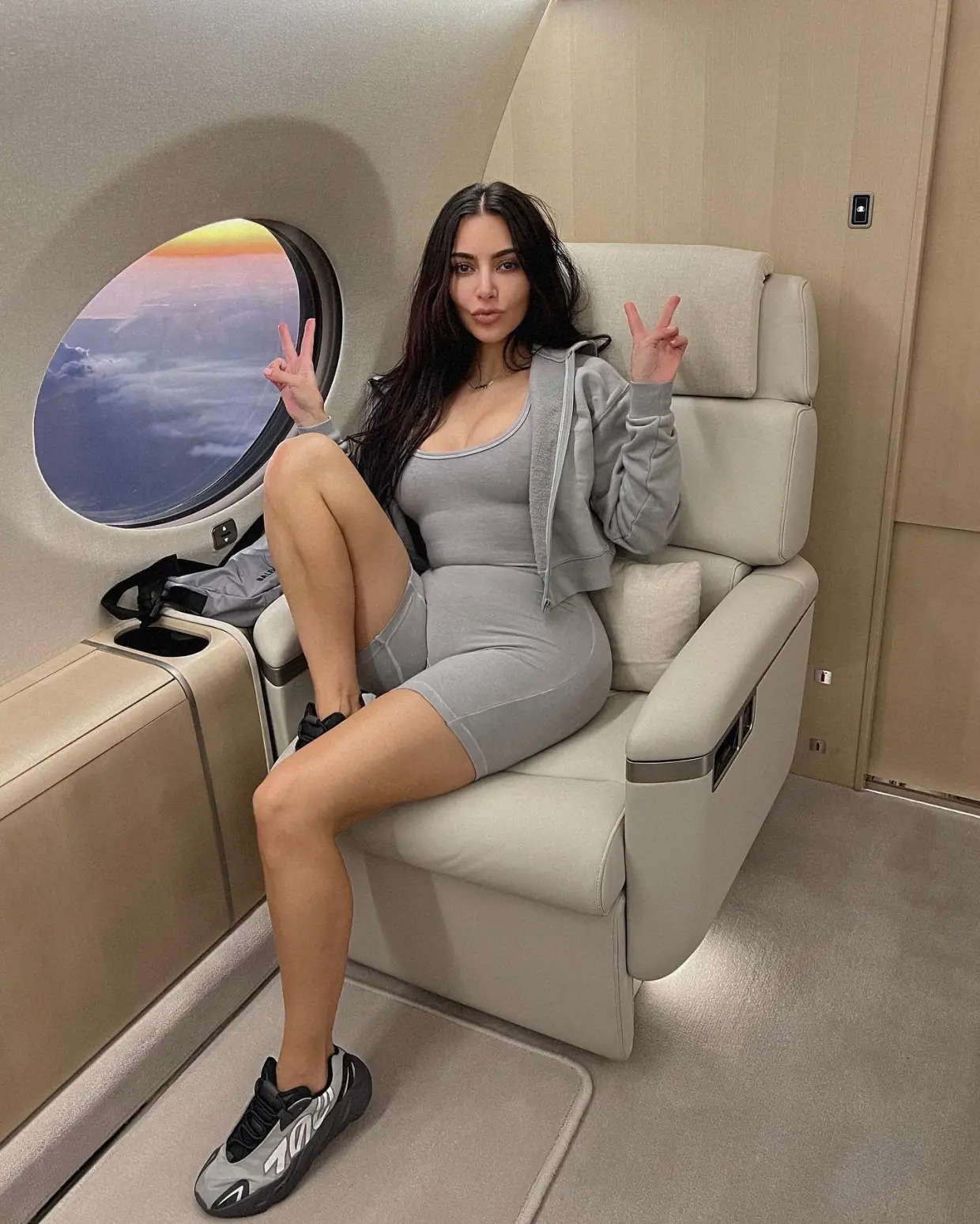 Kardashian fans slam Kim as ‘tasteless’ for posing with a mountain of designer bags after outrage for ‘flaunting wealth’