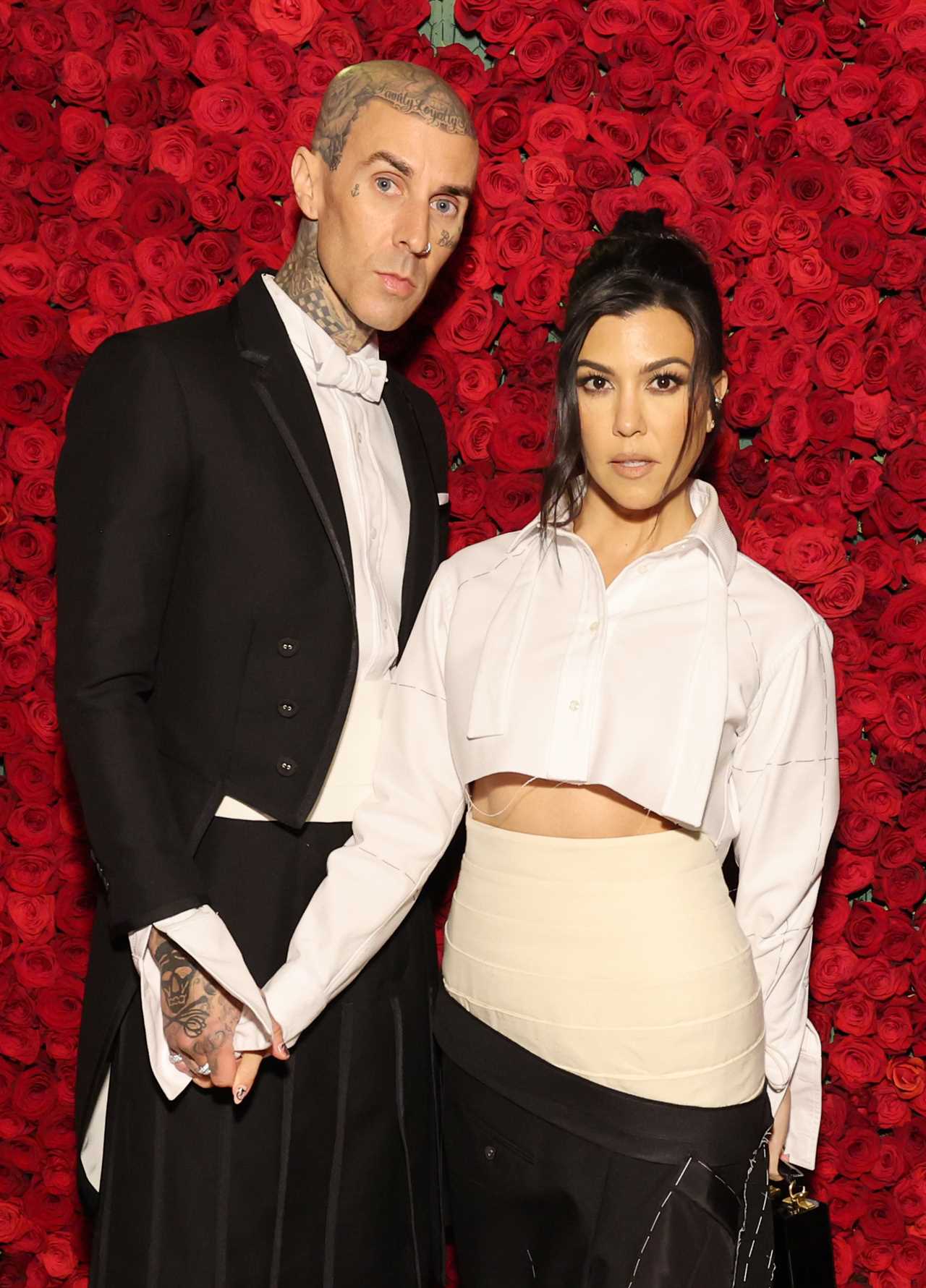 Kourtney Kardashian hides her stomach with baggy pants as fans convinced she’s pregnant with Travis Barker’s baby