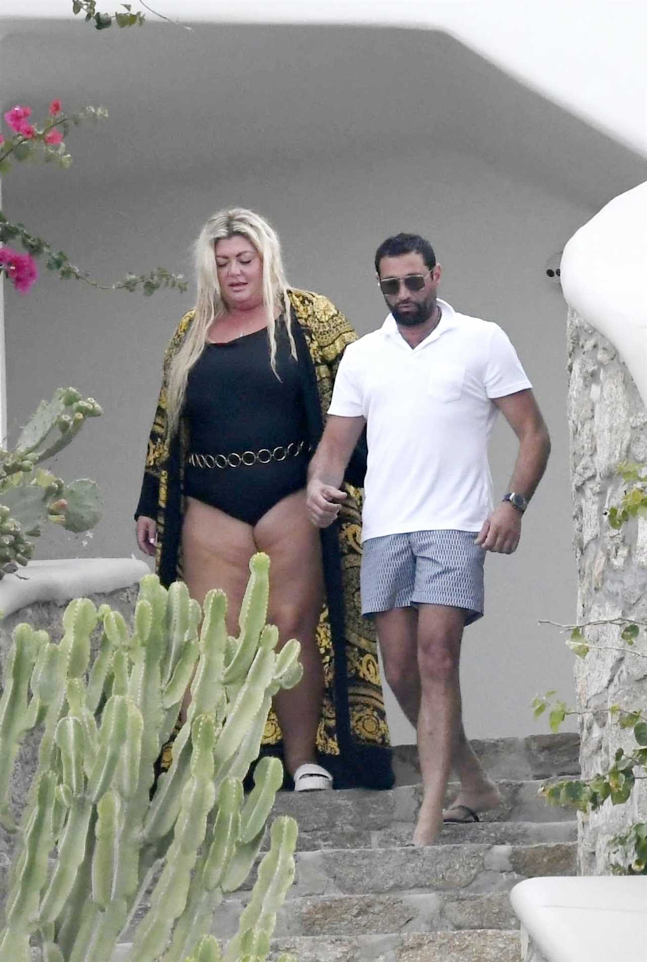 Gemma Collins adjusts her swimsuit and she puts on a sexy show for boyfriend Rami on holiday in Mykonos