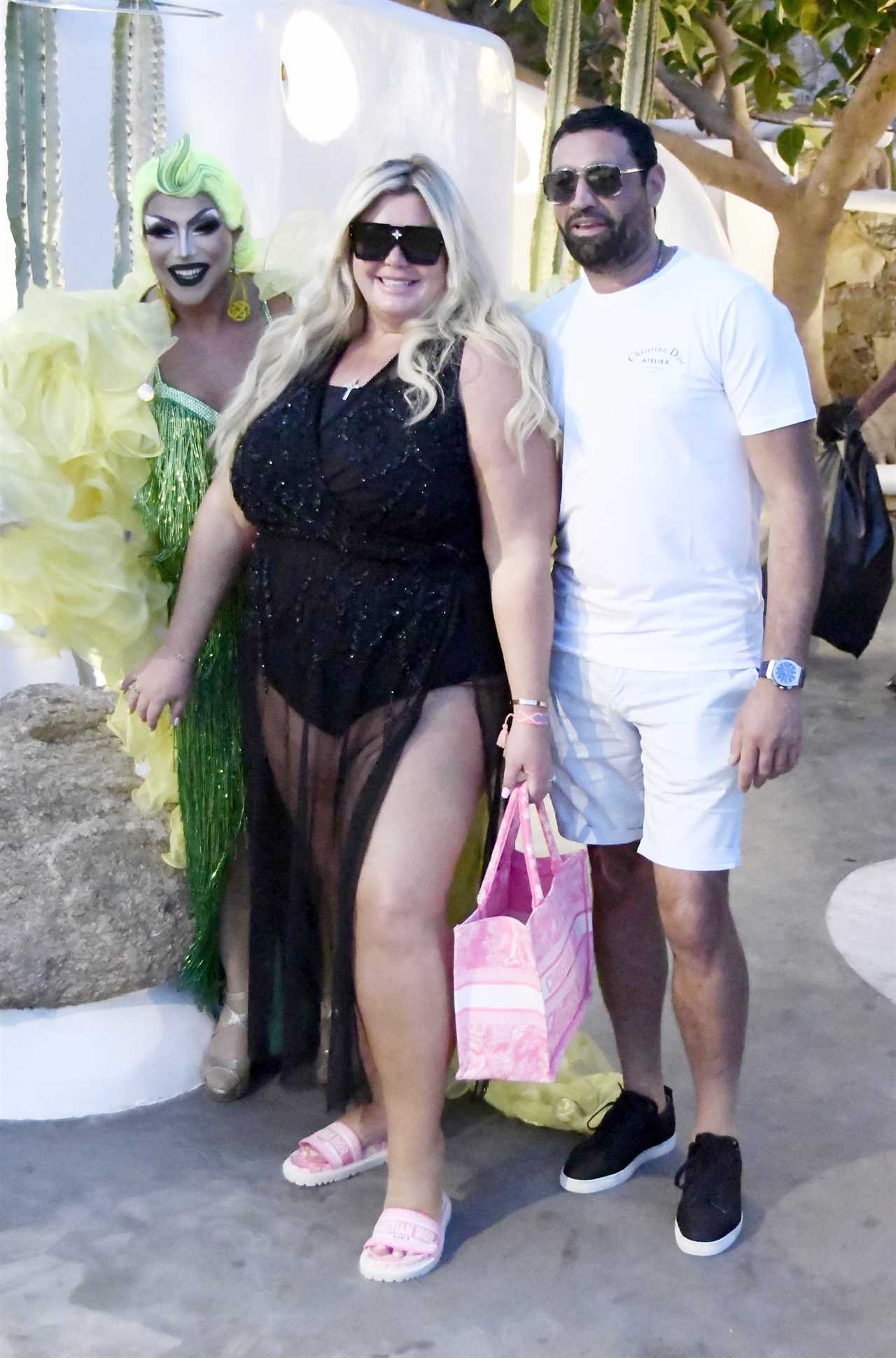 Gemma Collins adjusts her swimsuit and she puts on a sexy show for boyfriend Rami on holiday in Mykonos