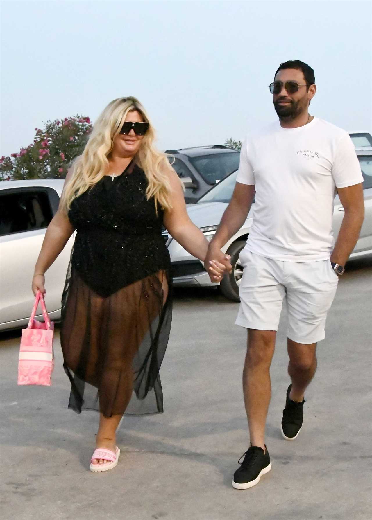 Gemma Collins adjusts her swimsuit and she puts on a sexy show for boyfriend Rami on holiday in Mykonos