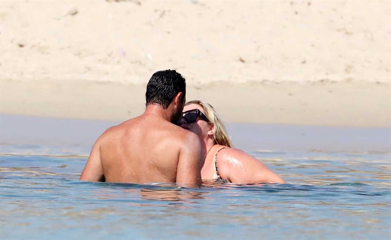 Gemma Collins looks more loved up than ever with fiancé Rami as they kiss in the sea in Greece