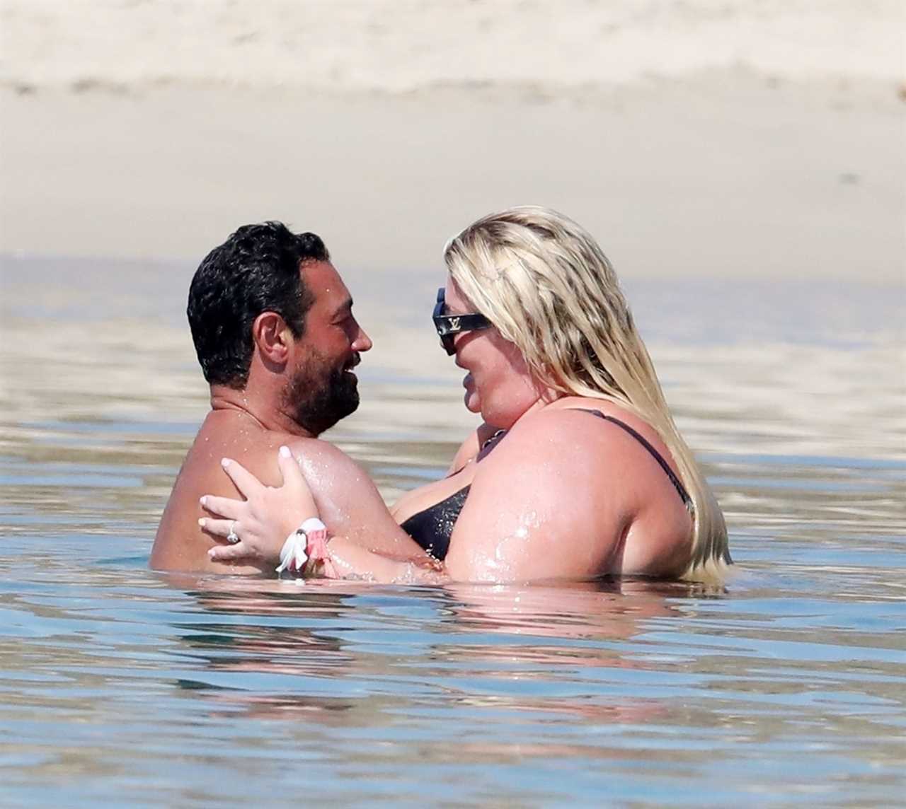 Gemma Collins looks more loved up than ever with fiancé Rami as they kiss in the sea in Greece