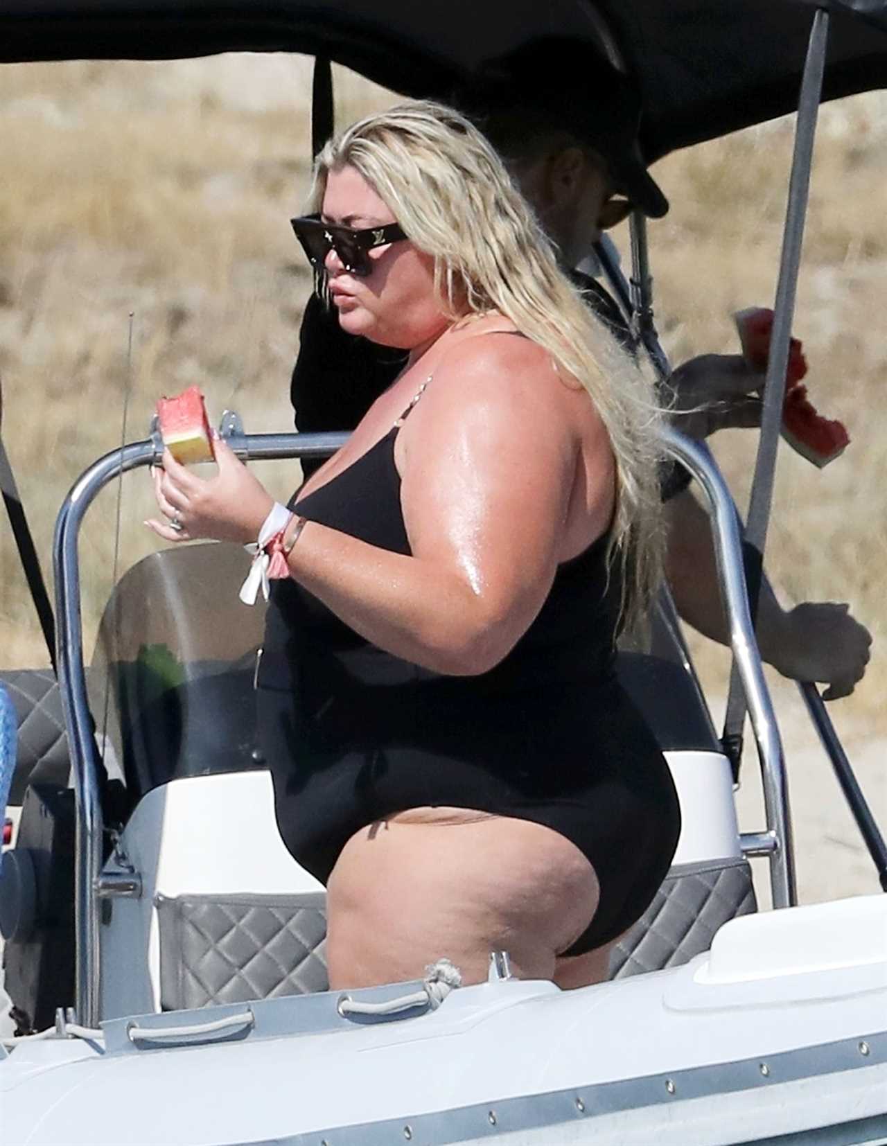 Gemma Collins looks more loved up than ever with fiancé Rami as they kiss in the sea in Greece