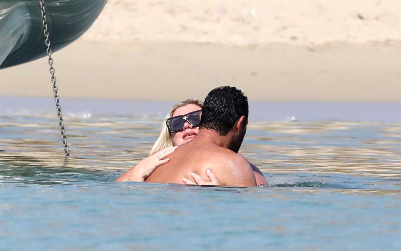 Gemma Collins looks more loved up than ever with fiancé Rami as they kiss in the sea in Greece