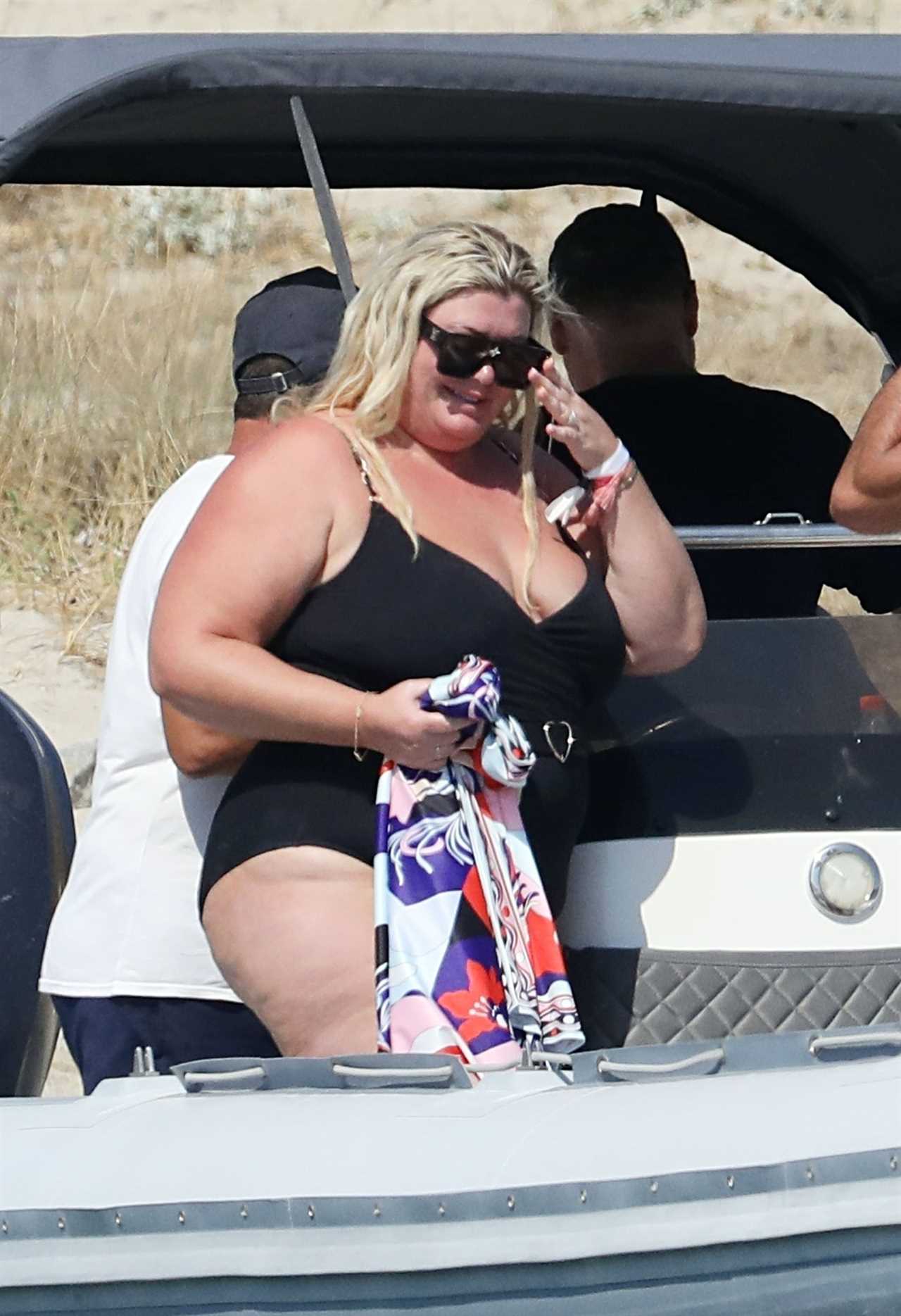 Gemma Collins looks more loved up than ever with fiancé Rami as they kiss in the sea in Greece