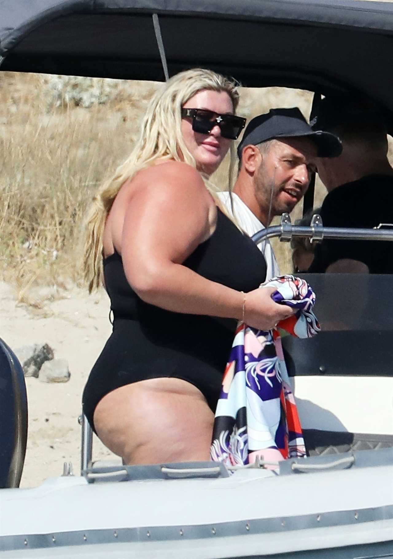 Gemma Collins looks more loved up than ever with fiancé Rami as they kiss in the sea in Greece