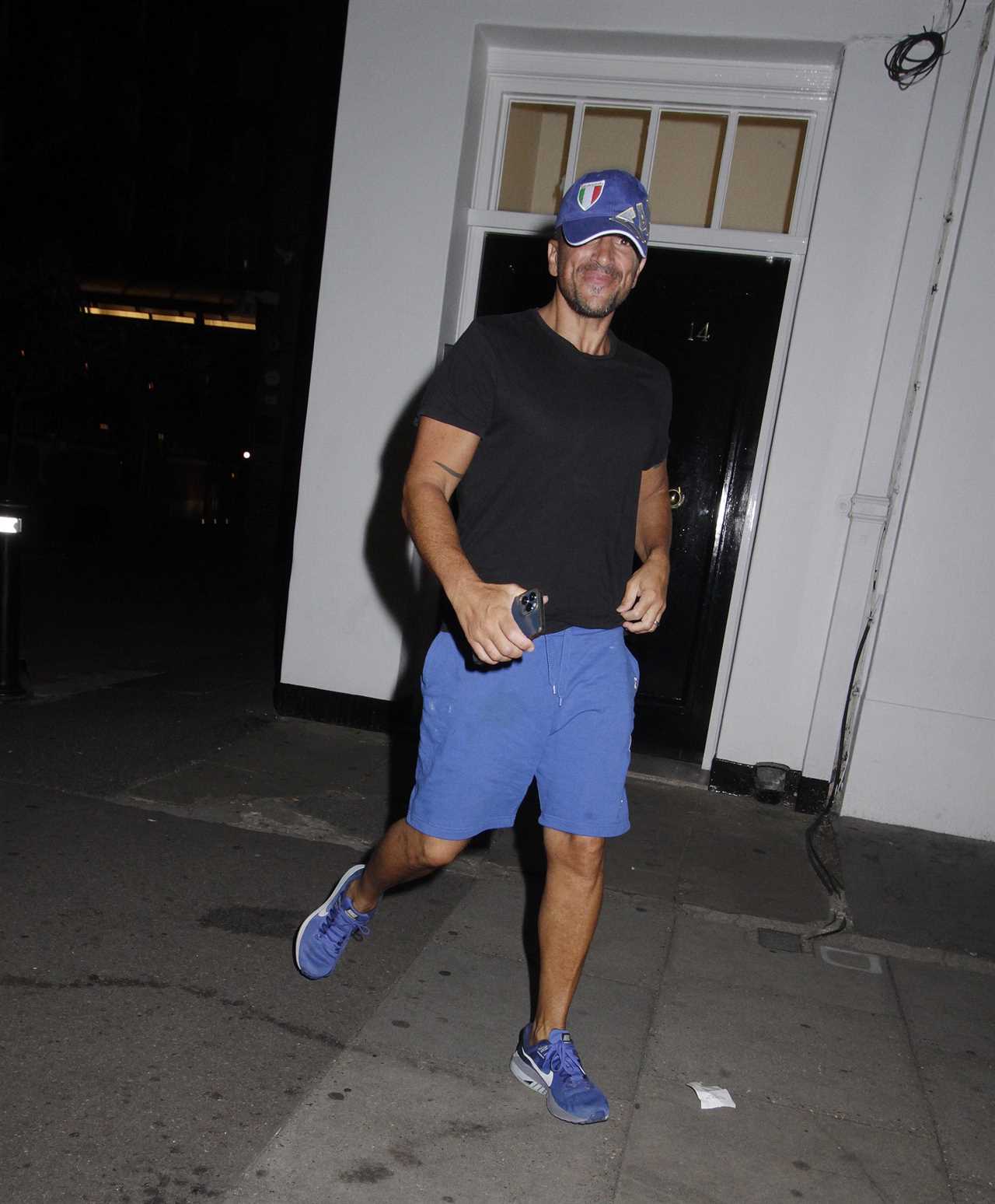 Peter Andre is all smiles as he leaves Grease musical in a T-shirt and shorts