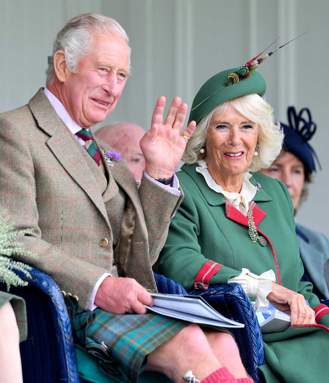 Prince Charles enjoys Highland games as he stands in for the Queen, 96, at one of her favourite events