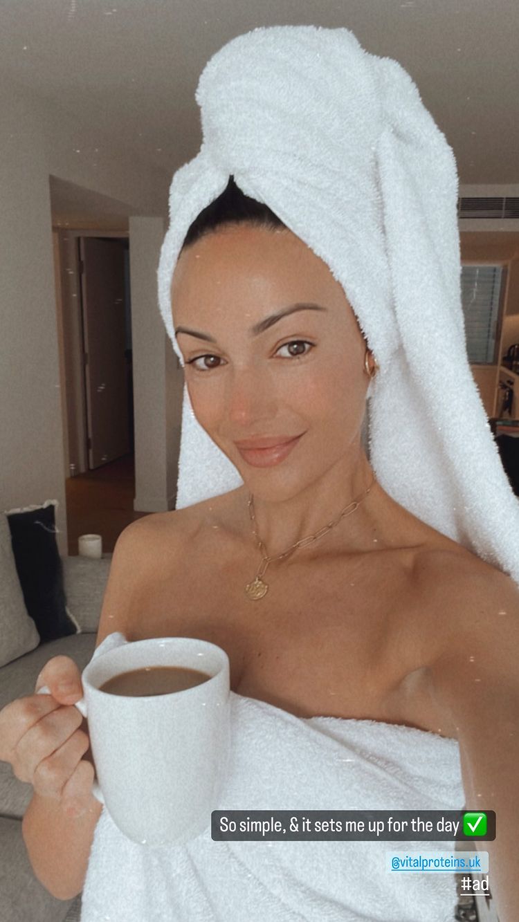 Michelle Keegan reveals flawless skin as she poses in just a towel in hotel room