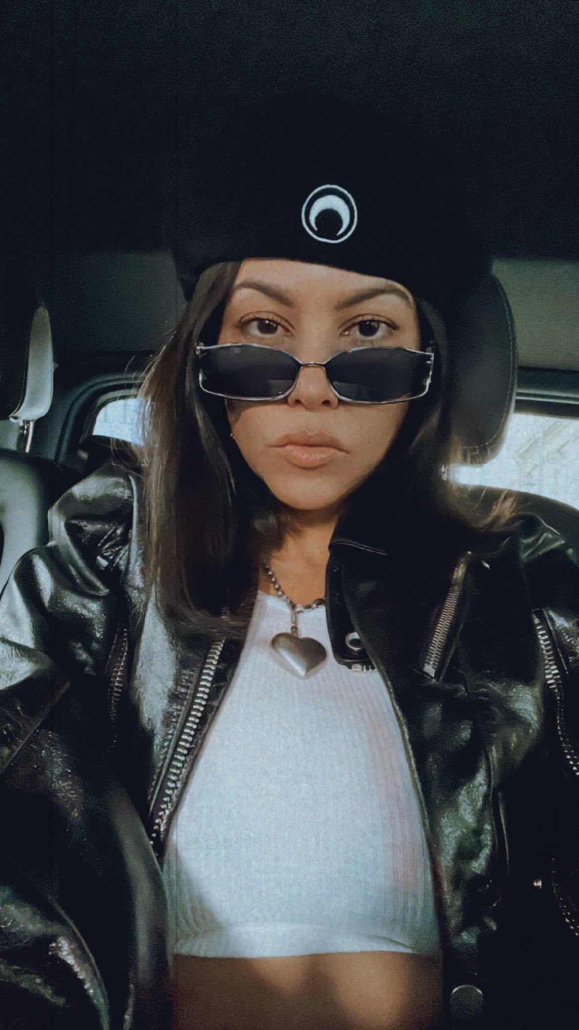 Kourtney Kardashian shows off real skin without makeup in unedited photo during London trip with husband Travis Barker