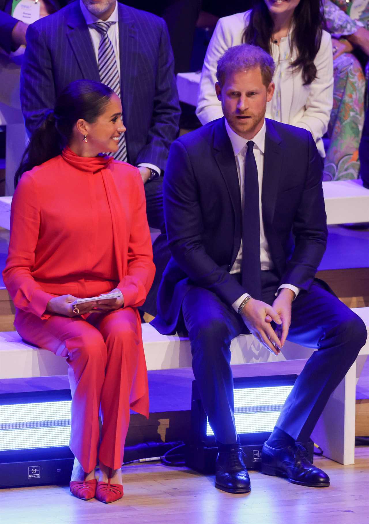 ‘Awkward’ Prince Harry ‘riddled with anxiety’ as ‘rock star’ Meghan Markle steals the show, claims body language expert