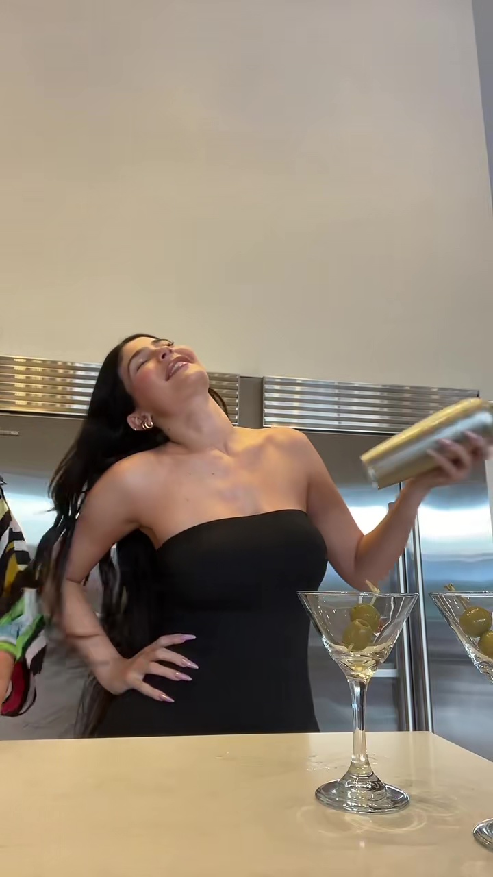 Kylie Jenner shows off her real post-baby body in tight dress as she drinks with mom Kris in new video