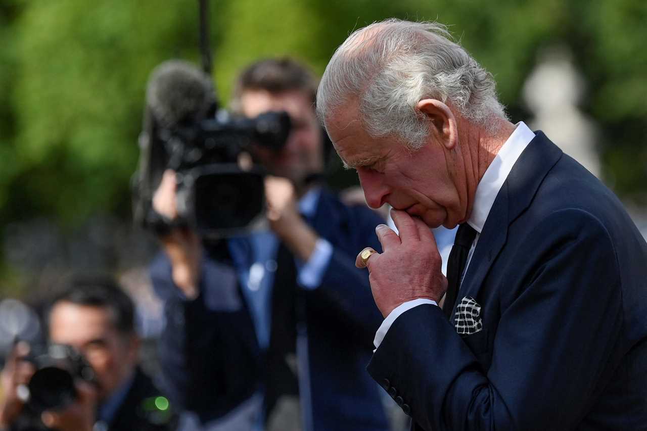 ‘Vulnerable’ King Charles ‘overwhelmed by grief’ as he looks at tributes to the Queen, body language expert claims